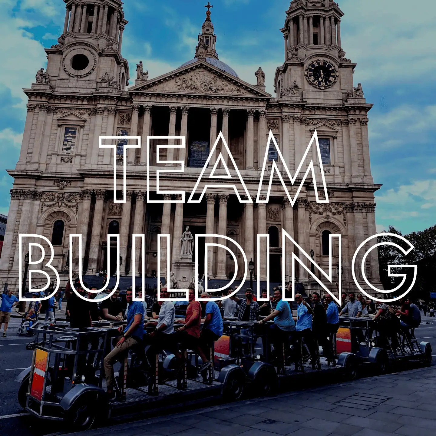 Three Pedibus London Beer Bike Vehicles, with a large group of people on board for a team-building activity, outside St. Paul's Cathedral
